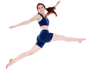 Fototapeta na wymiar beautiful teenage girl in workout clothes leaping