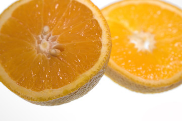 Fototapeta na wymiar orange cut in half on white background