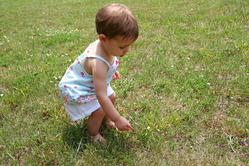 baby girl and weeds