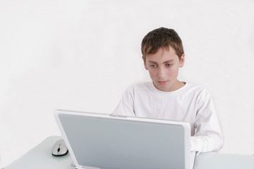 teenager working on a computer