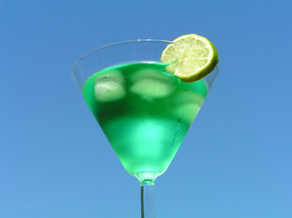 green liquid with slice of lemon