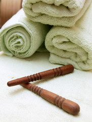 thai massage sticks and towel