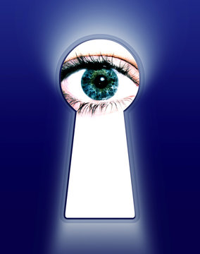 blue eye looking thru a keyhole