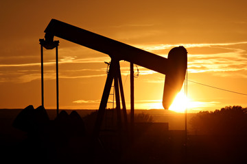 oil pump against setting sun