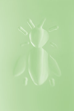 green pressed glass honey bee