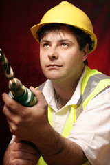 tradesmen with a drill
