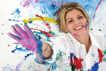 beautiful young woman covered in paint