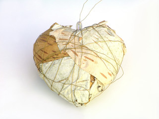 christmas heart made of birch bark with golden str