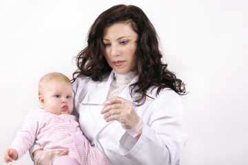 doctor with baby and thermometer