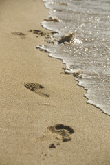 Fototapeta na wymiar Foot drukuje w piasku