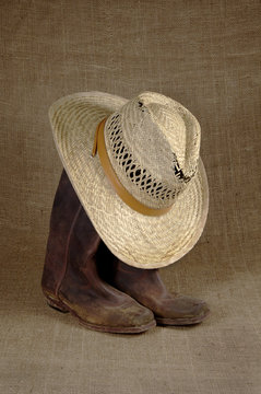 boots and hat on burlap