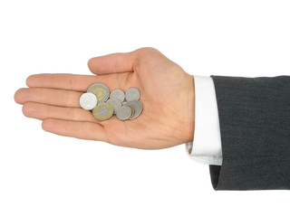 businessman's hand holding coins