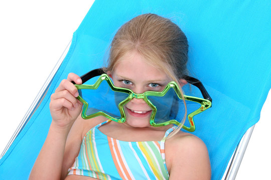 stock photography: young girl with big funny sungl