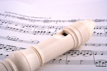 recorder on sheet music
