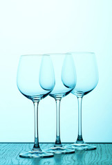 three bluewine glasses