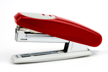 red stapler on the white background