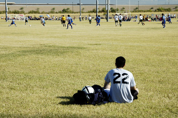 soccer player watching the action.