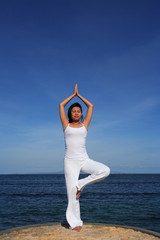 Fototapeta na wymiar yoga by sea