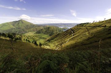 landscape with mountains  near toba lake in sumatra - obrazy, fototapety, plakaty