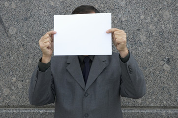 businessman with blank sign