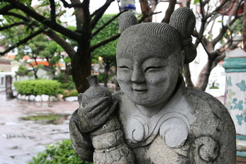 Obraz premium statue de jeune asiatique