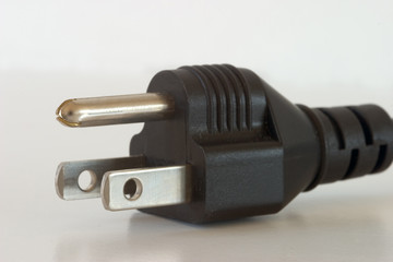 three-pronged plug