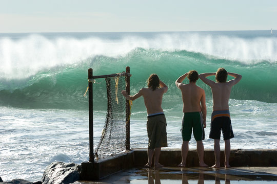 boys checking out the surf