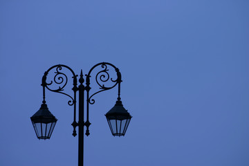 Fototapeta na wymiar sihouette of old street light