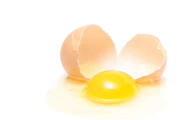 broken egg over white