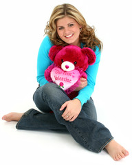 blonde woman hugging bear