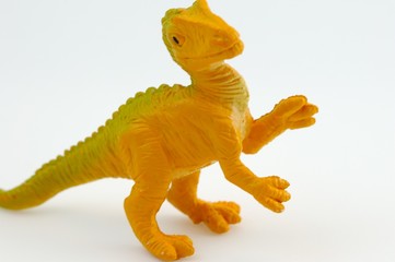 Fototapeta na wymiar Zabawka dinozaur