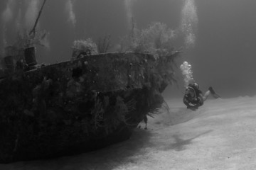 wreck diver in black and white