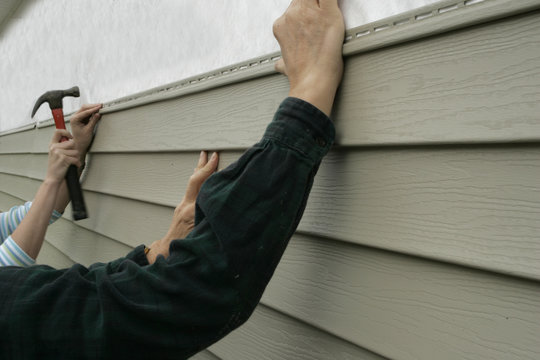 installing siding on a house