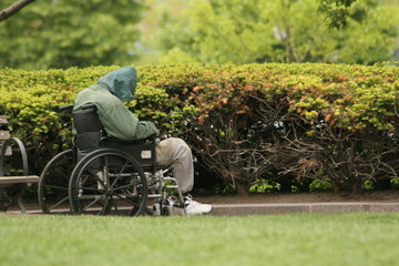 homeless man in wheel chair