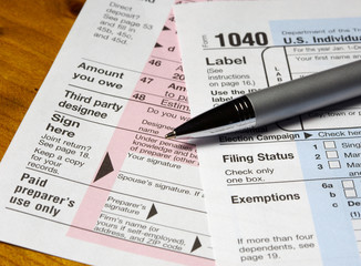 tax forms & pen