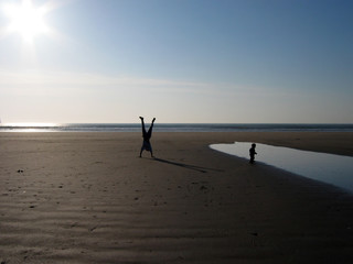 armstand on the beach