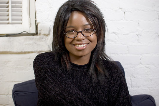 attractive young black woman wearing glasses
