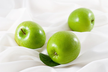 three green apples