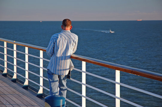 Man On Cruise At Railing