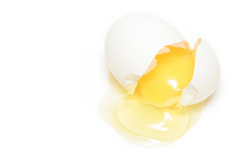 cracked egg over white - 294774