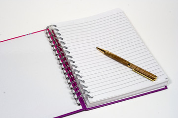 front page of notepad and pen