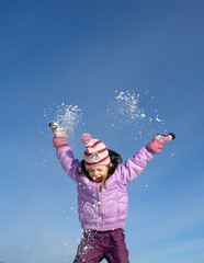 jumping winter girl