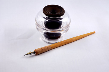 old pen and glass inkwell