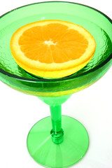 half an orange in glass