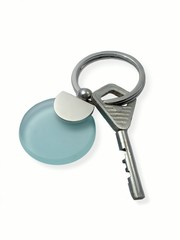 key with green glass decoration