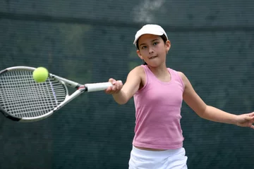 Poster young girl playing tennis © Galina Barskaya