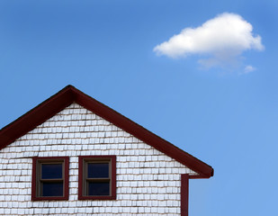 house and blue sky with cloud