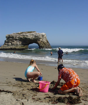 Kids Playing On The Beach At Santa Cruz, Ca