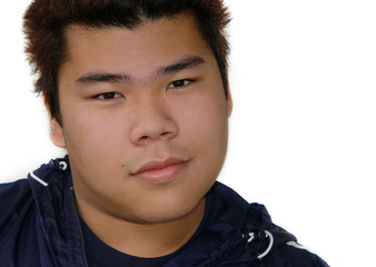 Obraz premium smiling asian teenage boy