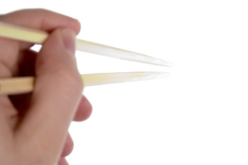 hand with chopsticks